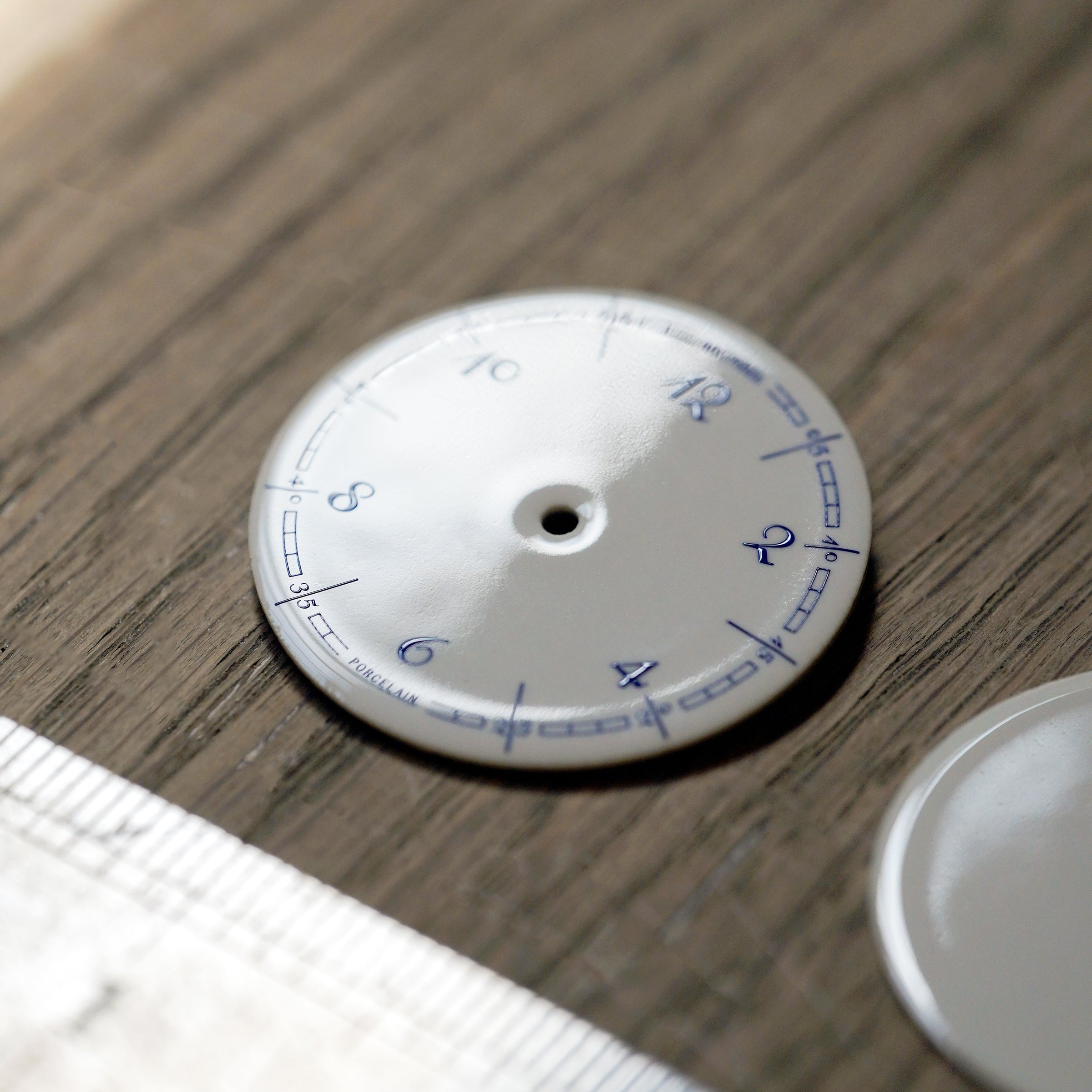 anOrdain Model 1 porcelain dial before assembly